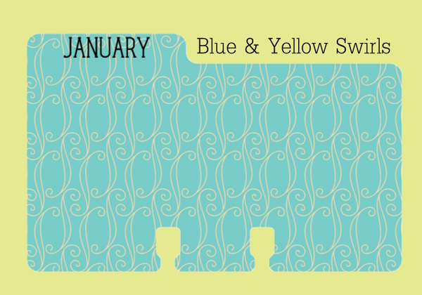 Monthly A colored Rolodex months divider: It is a medium blue with a swirly yellow print. The word "JANUARY" is on the Rolodex tab. It is on a yellow background with the words "Blue & Yellow Swirls" written in black.