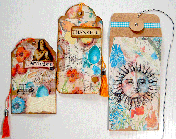 Two colorful tags and an envelope that are decorated with the floral and checkered and black and white digital papers.