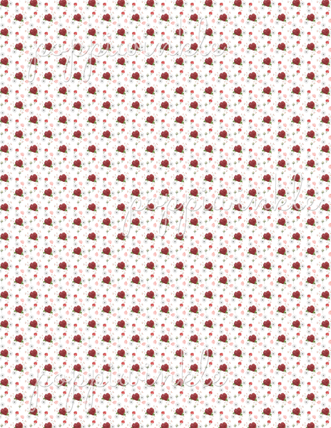 A white background with red roses and smaller pink and red flowers and black and white elements in a diagonal pattern.