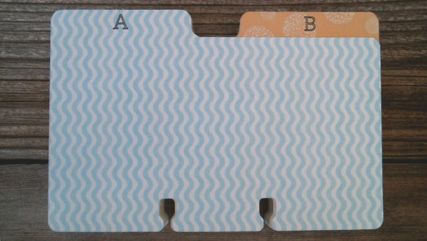 3" x 5" Rolodex dividers in blue wave and orange puff patterns.