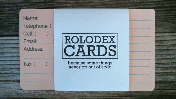 A pack of 3 x 5 Rolodex contact cards in 6 colors. The pink card is on top. The wrapper says "ROLODEX CARDS - because some things never go out of style".