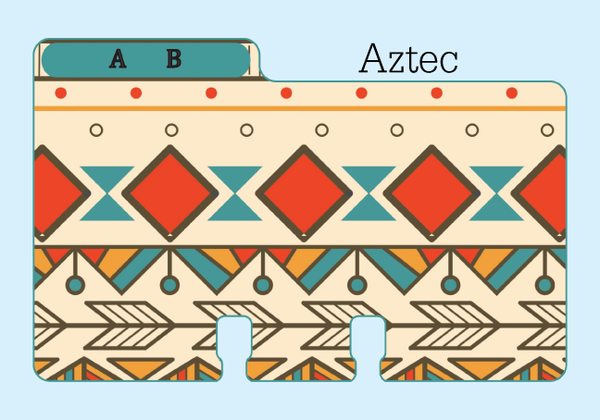 A handmade Rolodex divider (A, B) in a tan, teal, gold, red and black tribal print. It is on a pale blue background with the word "Aztec."