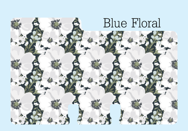 A sturdy Floral Rolodex Divider in pretty black, blue, gray, green and white print. It is on a pale blue background with the words "Blue Floral."