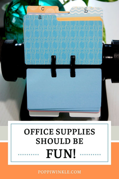 A Rolodex with pretty handmade Rolodex cards and dividers. Underneath is a sign that says "Office supplies should be fun!"