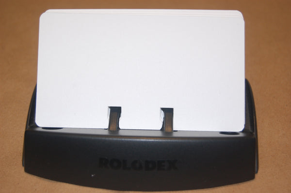 White Rolodex cards in a black Rolodex holder