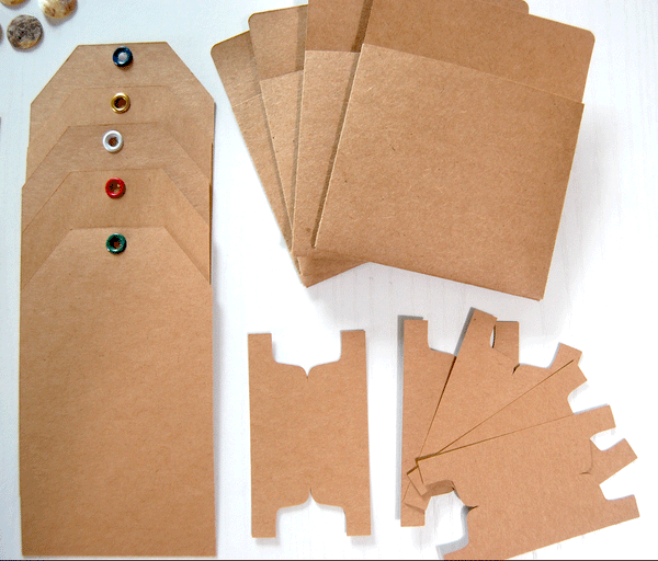 5 Kraft tags with metal eyelets, 4 kraft library pockets, and 5 kraft book page tabs (unfolded).