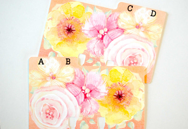 Two Floral Watercolor Rolodex Dividers: They are a coral background with watercolor flowers in yellow, pink, white and green. The one on the bottom has the letters A,B on a left tab. The one on the top has the letters C,D on a right tab.