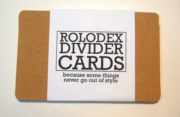 A wrapped set of kraft cardstock Rolodex dividers. The label says "because some things never go out of style."