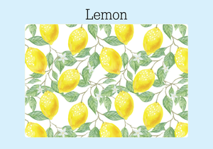 The heavy duty front cover of a Lemon Password Keeper. The white background has yellow lemons, green leaves and white flowers. It is displayed on a pale blue background with the word "Lemon."